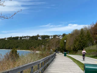 Boardwalk with West Bluff cottages on the cliff