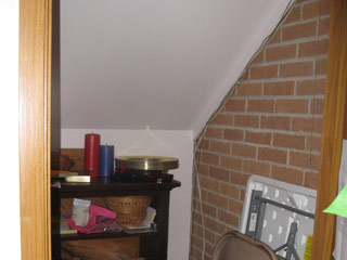 The closet in the foyer where Zach hid.